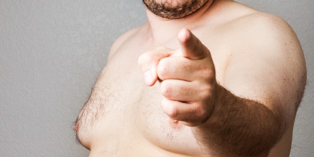 Fat naked man pointing firmly